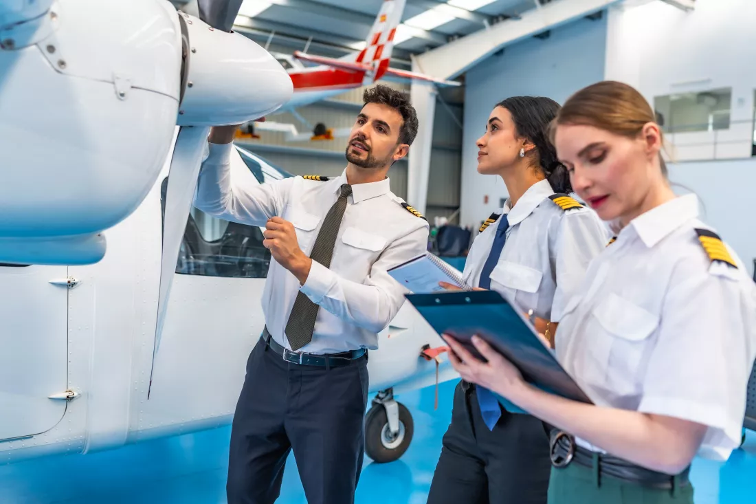 aviation-team-conducting-aircraft-inspection-hangar
